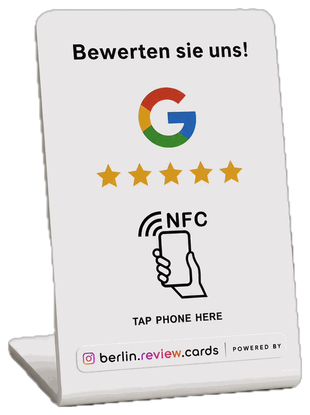 Großer weißer Ständer mit Google-Logo und der Aufschrift „Bewerten sie uns!“